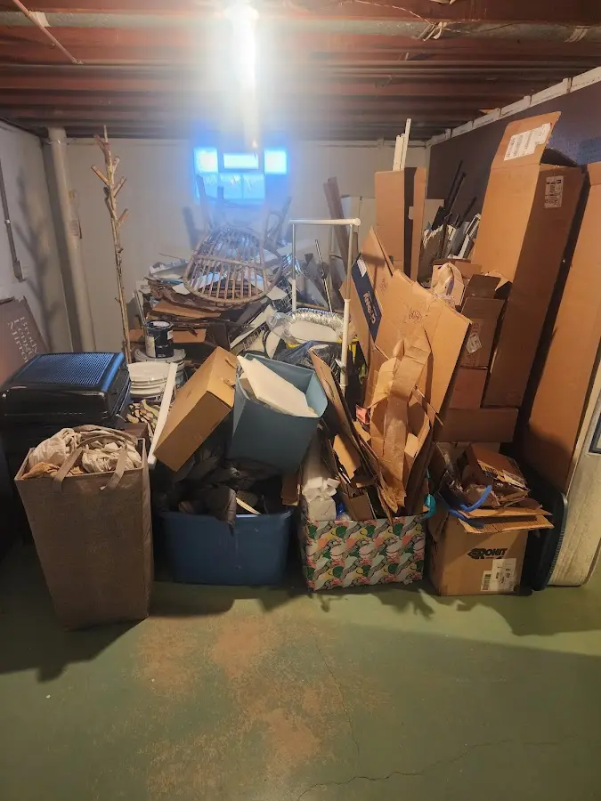 Roll-off dumpster container at job site for 8 Yard Dumpster Rental in Southwick